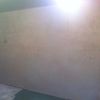 Plastered wall following the chimney removal